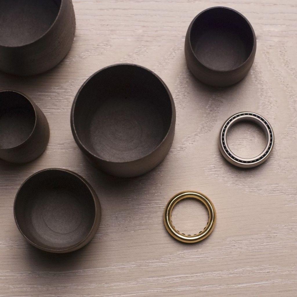 Take a spin inside a Sean O'Connell Ball Track ring - black ceramic and polished ruby ball bearings rotate inside g…