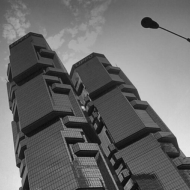 monochromemaven's tweet photo. Looking up at the Lippo Center in Hong Kong, China.
Photo by Monochrome Maven: @jen.jing 
Thanks for sharing your c… http://t.co/0NvSU1MrLT