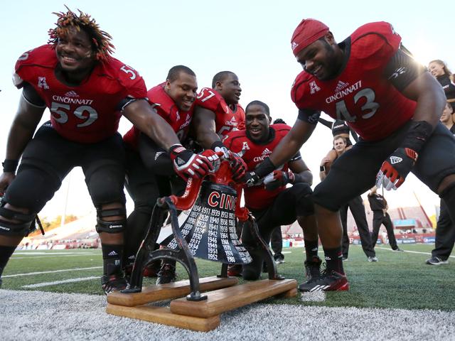 GoBearcatsFB's tweet photo. It's officially #BattleForTheBell week! DYK this year marks the 120th meeting between the #Bearcats and Miami (OH)? http://t.co/E400zTFnby
