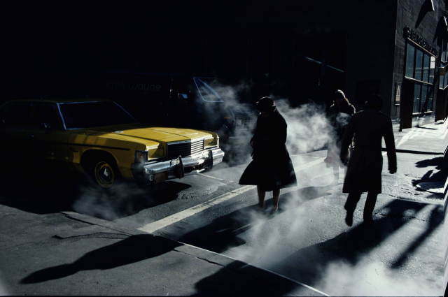 PocketBarNYC's tweet photo. Still from a film noir scene? Nah, just Manhattan circa 1980 (Sixth Avenue and 49th). Photo credit: Ernst Haas. http://t.co/8uU01MipD3