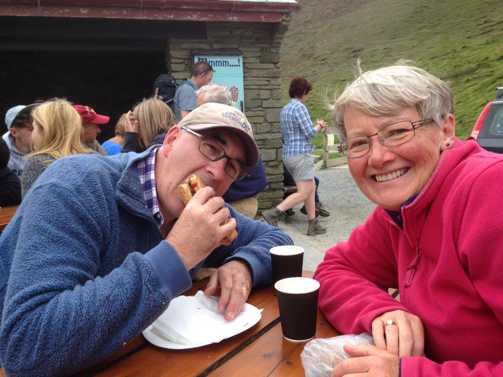 Enjoying mega sausage baguette at Chapelporth. Wonderful.
