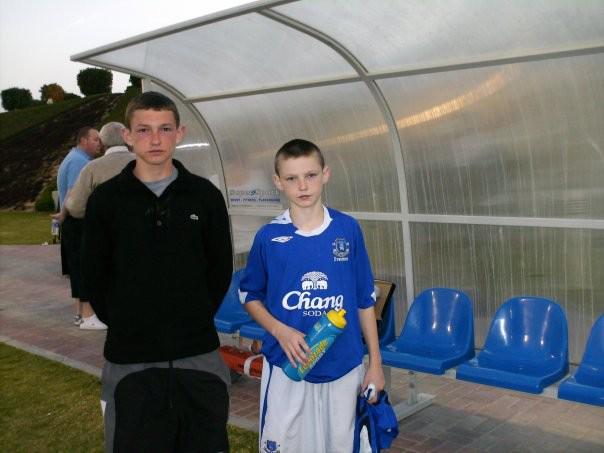 Anyone know who this kid is an the right?