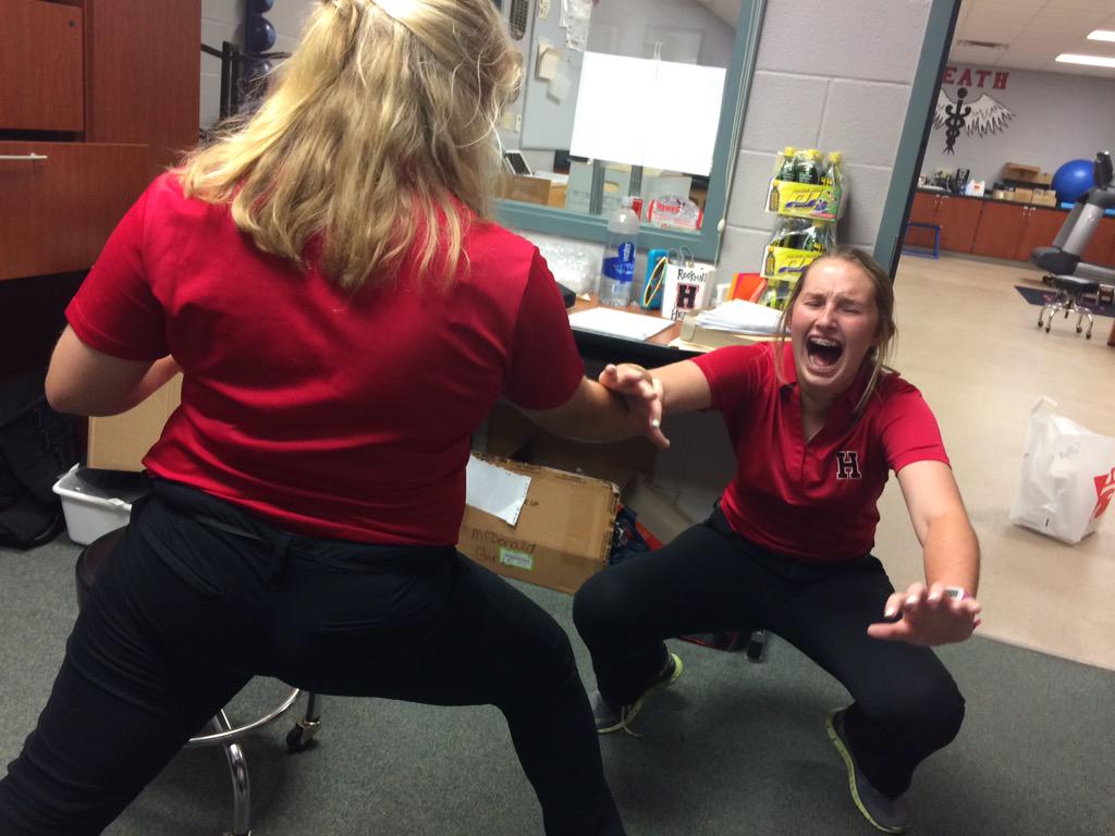 HeathSportsMed's tweet photo. My freshman girls getting w good stretch in before the double header tonight! #crackinmeup #gohawkd http://t.co/YsfxPevIiI