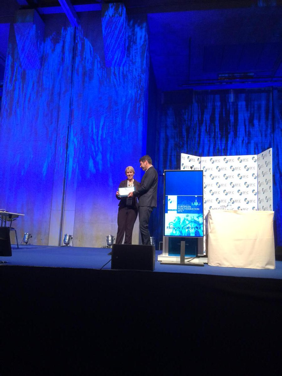 ChrisWells4's tweet photo. Chris presents award to Michele #efic2015 http://t.co/XCtj2u7Dv7