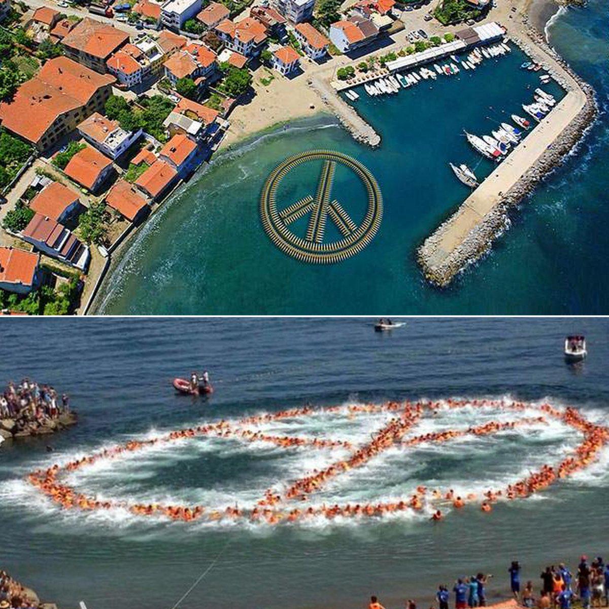 460 swimmers mark Victory Day with floating peace symbol... 

on.fb.me/1JSTZsx