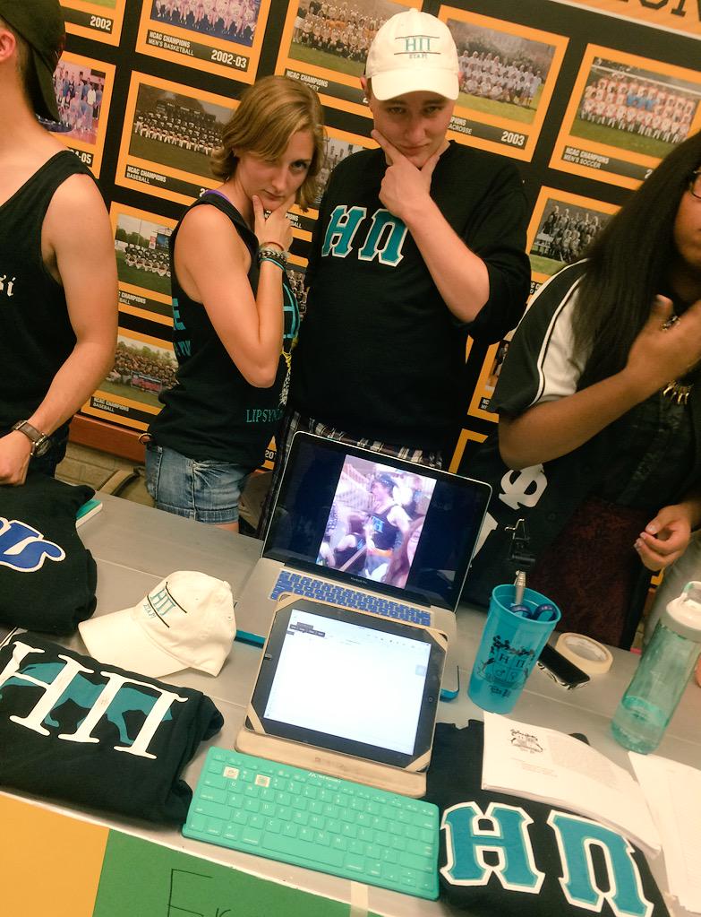 Eta_Pi_'s tweet image. Josh '16 and Kayla '17 behind our table at Scot Spirit Day #chetaetapi 💙🐾