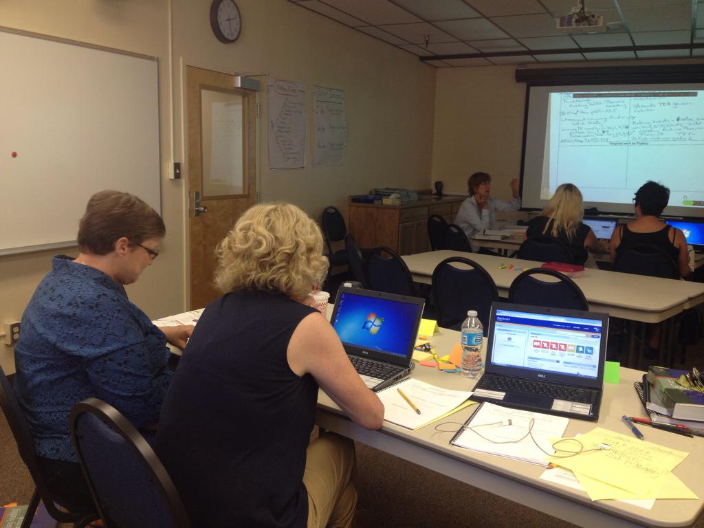 WhitSpalding's tweet photo. RUSD third grade teachers hard at work at today's Reading Academy training!#teamredlands #collaboration @mentoneRUSD http://t.co/i3A6UBfuBJ