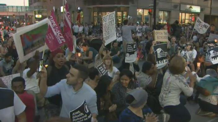 CTVToronto's tweet photo. ‘No one is illegal’ protest moves along major downtown streets http://t.co/KYNcTSjBuV http://t.co/xrR3UGToqb