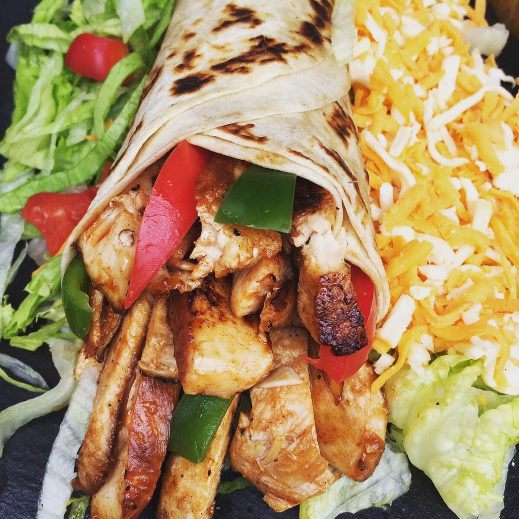 Fresh British Chicken on a crispy wrap with our homemade cheese sauce.Try one today. @CamdenMarket@camdenmanager
