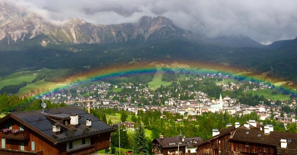 Haute_Route's tweet photo. At the end of this rainbow: A pot of gold and #hauteroute finish line. The view of Cortina http://t.co/zmddCFSt1A