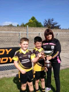 jdrrmcc's tweet photo. @theplunkettsgac @lisaarm138 proud day for lisa handing over trophy to Plunketts #welldonetoall http://t.co/3NuUO8eV65