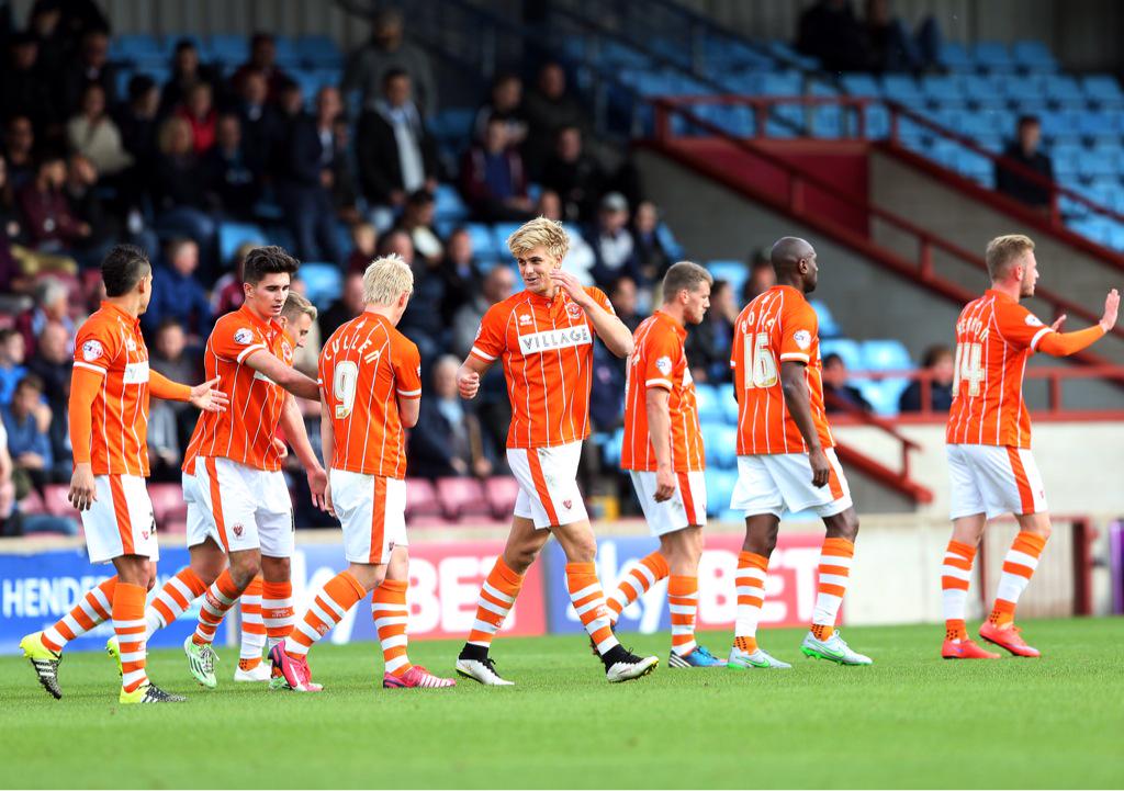 BlackpoolFC's tweet photo. Pic | Brad Potts celebrates netting Blackpool's winner at Scunthorpe this afternoon. http://t.co/w0qqCvHui3