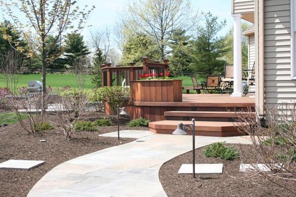 ArchadeckNS's tweet photo. Natural stone patio, tropical hardwood decking. #HalifaxDecks #HalifaxGrilling #HalifaxPatios http://t.co/tSDAvM6p8e