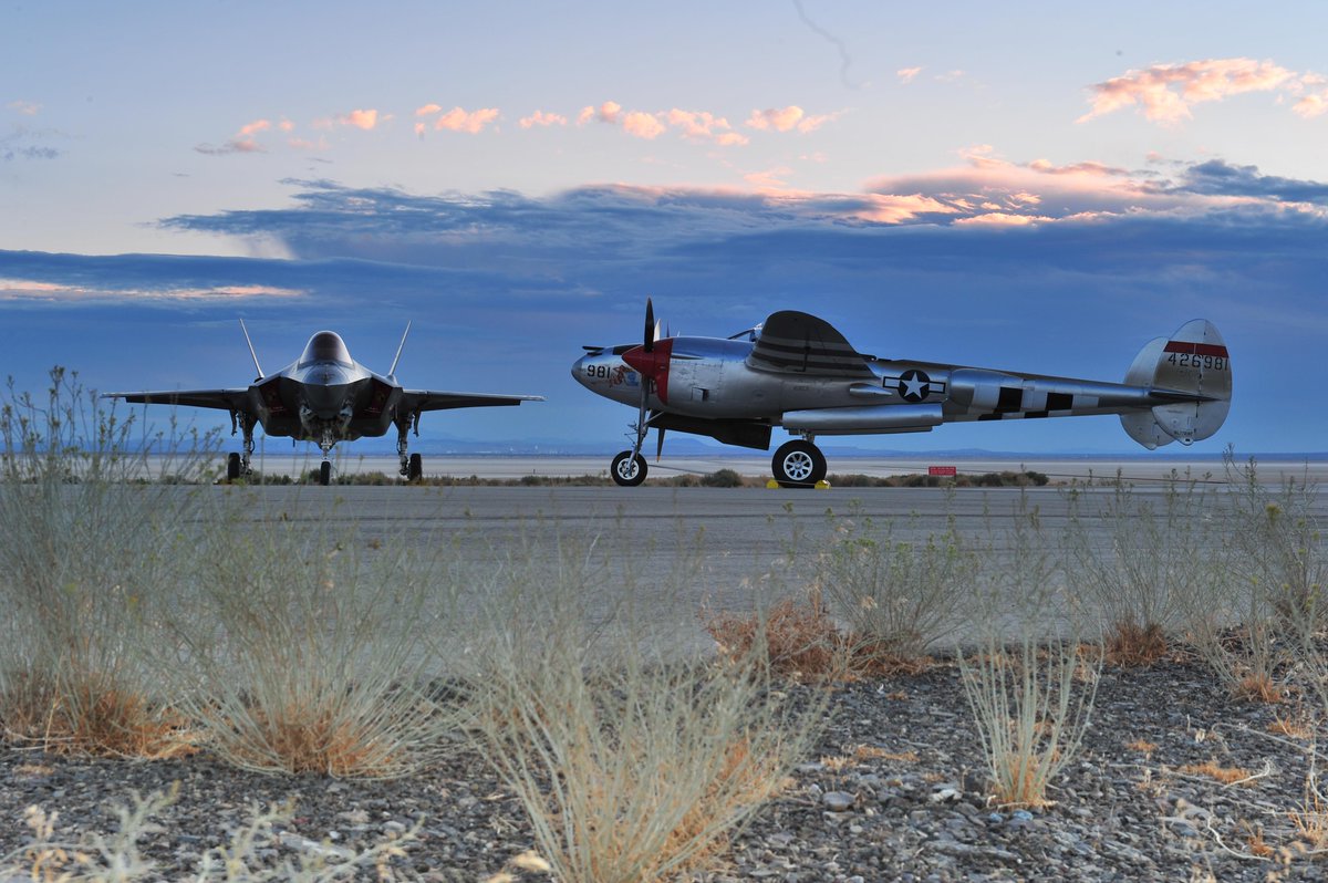 TheUSDefense's tweet photo. A P-38 Lightning meets its younger brother, the F-35A Lightning II. @LockheedMartin @thef35 http://t.co/Bj1tk0q4jR