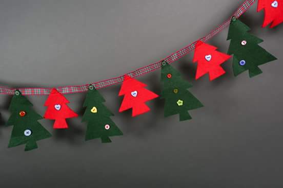 Barmy_Bunting's tweet photo. Just some of the Barmy Christmas bunting we are making  - on a sunny Sunday in September! 😊 @LadiesLinks @The_Pitch http://t.co/q3gKjFyCAq