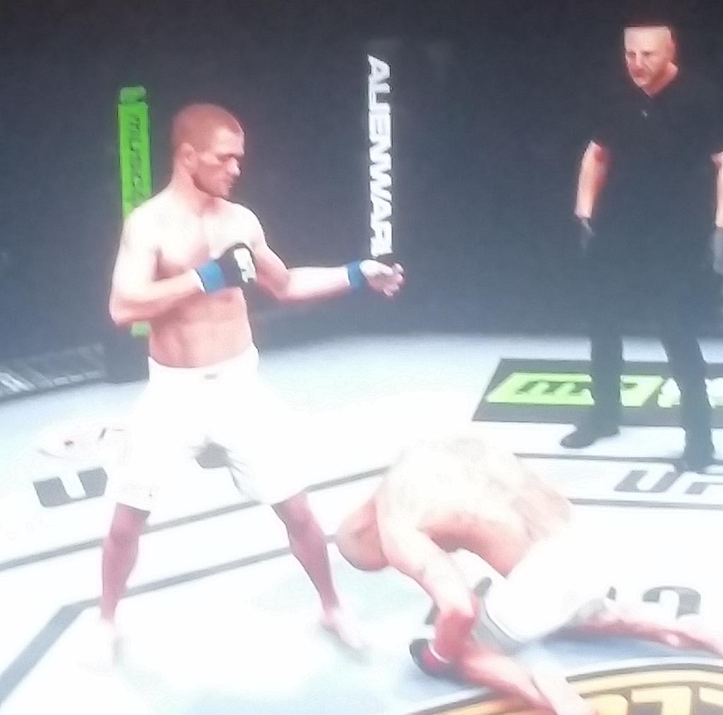 LHLCapitals's tweet photo. @EASPORTSUFC yeah don't worry Yves, this fights not over yet, he's not knocked out or anything http://t.co/5OQKnQ27A0
