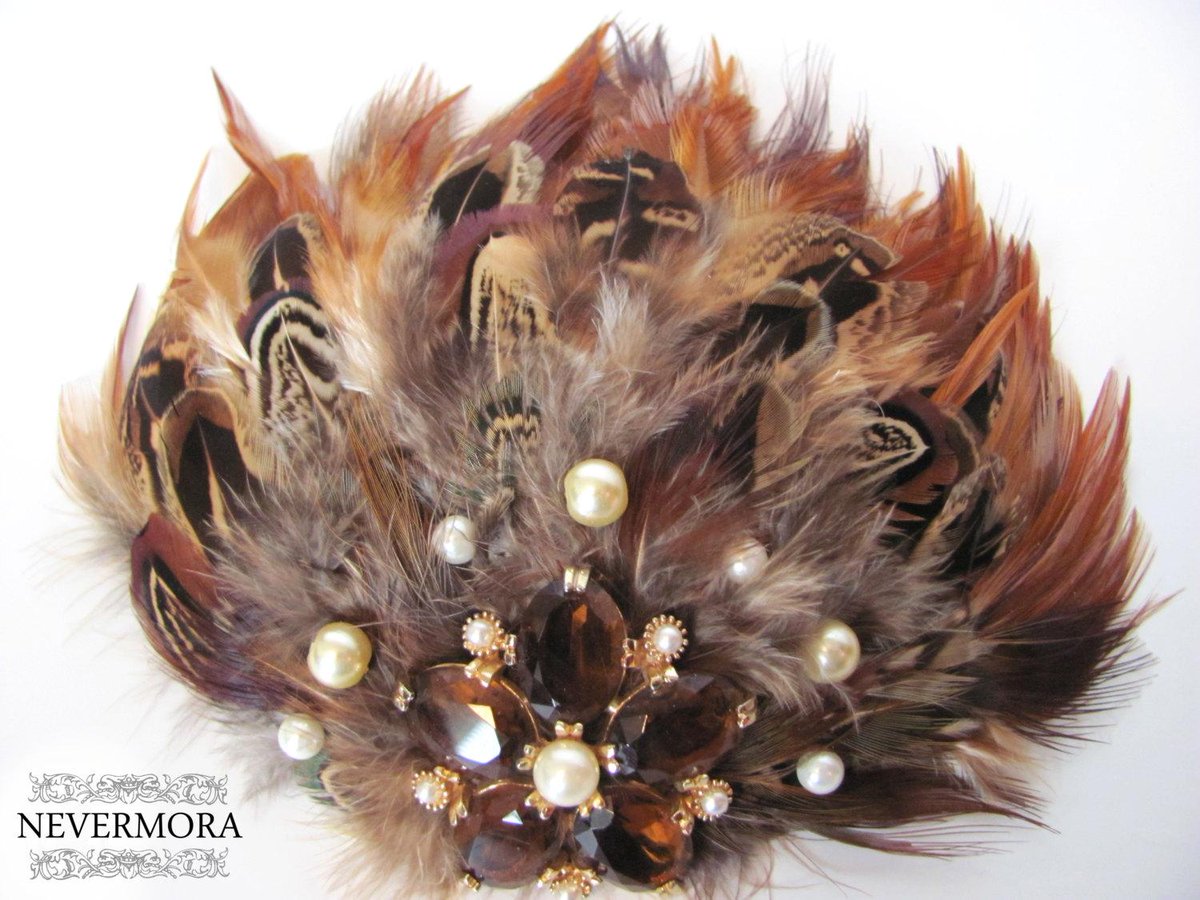 NevermoraShop's tweet photo. SALE - Handsewn Mixed Feather and Vintage Brooch Fascinator https://t.co/qKhvgysEpb #Nevermora #Nevermora http://t.co/58CQhOztLH