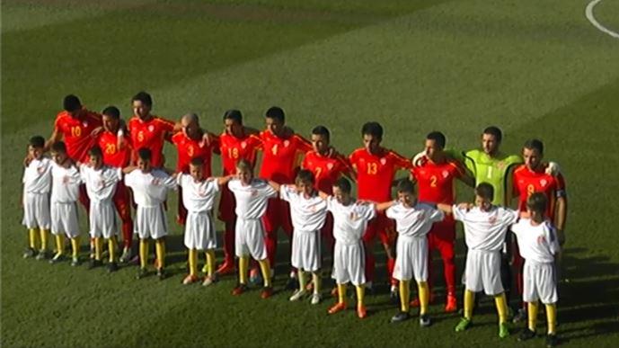 The starters get ready to sing the anthem