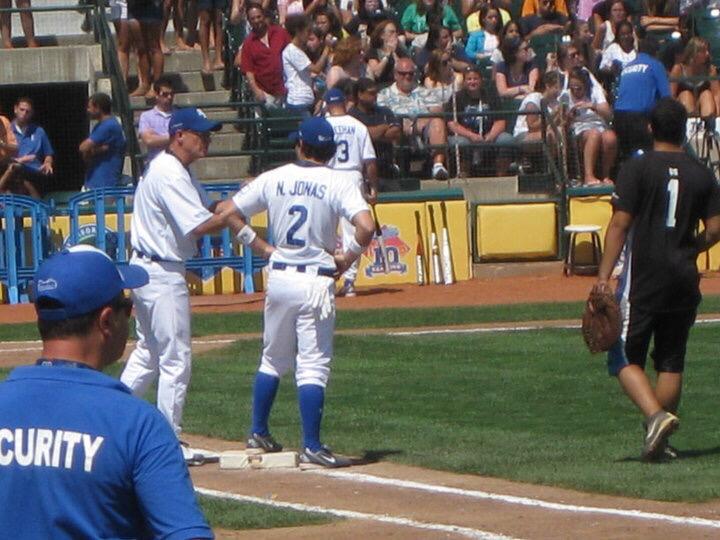 lauraasann's tweet photo. In honor of @nickjonas being on Marshall st rn, tb to that time I saw the JoBros play softball #goRoadDogs http://t.co/ueAH0ZVjC2