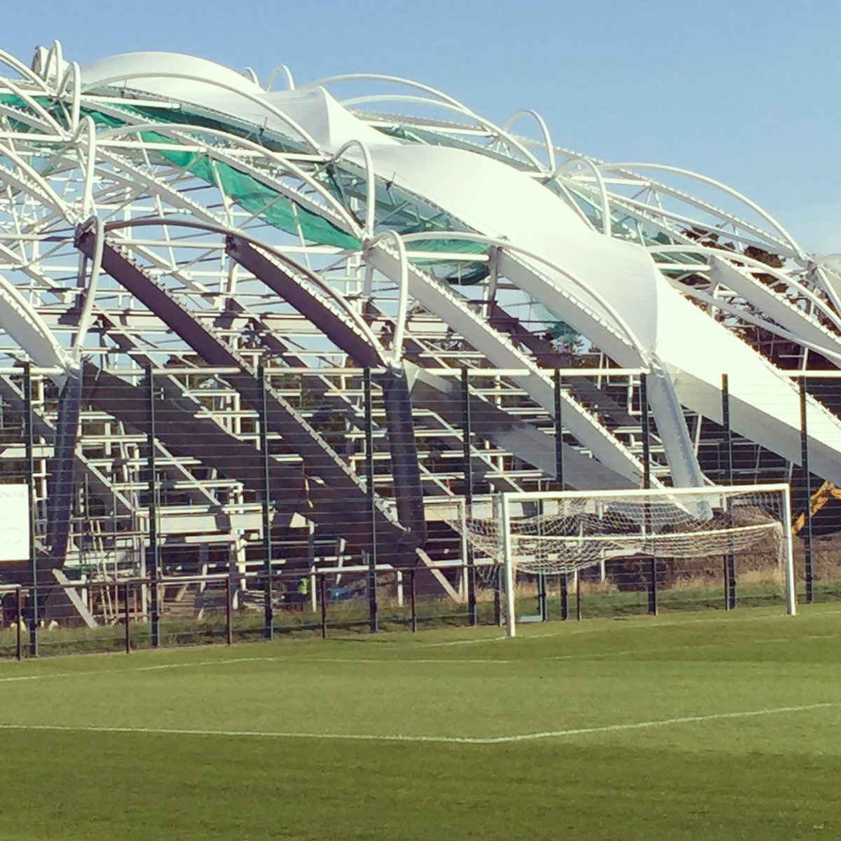 The indoor 3G PVC roof being installed @oriamscotland #architecture #keeptherainout