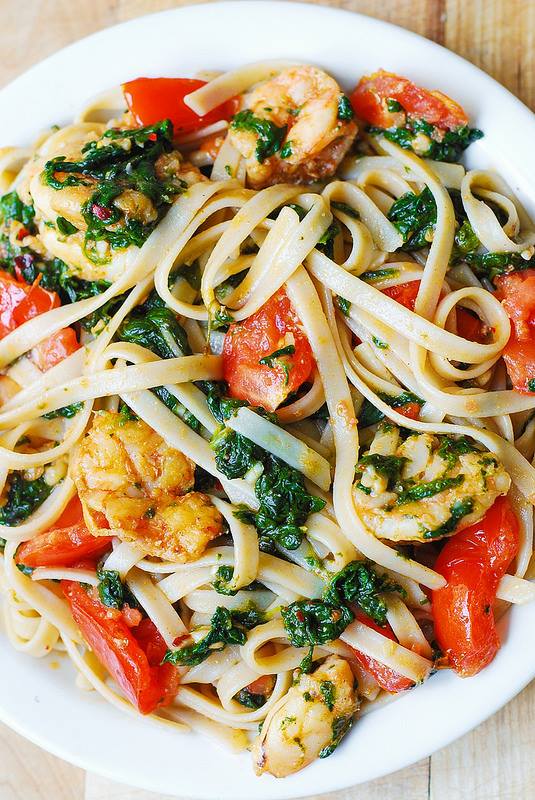 Today: Spinach, tomatoes, garlic, onions, bacon tossed w/ pasta. Handle w/care or your shirt + heart will get messy.
