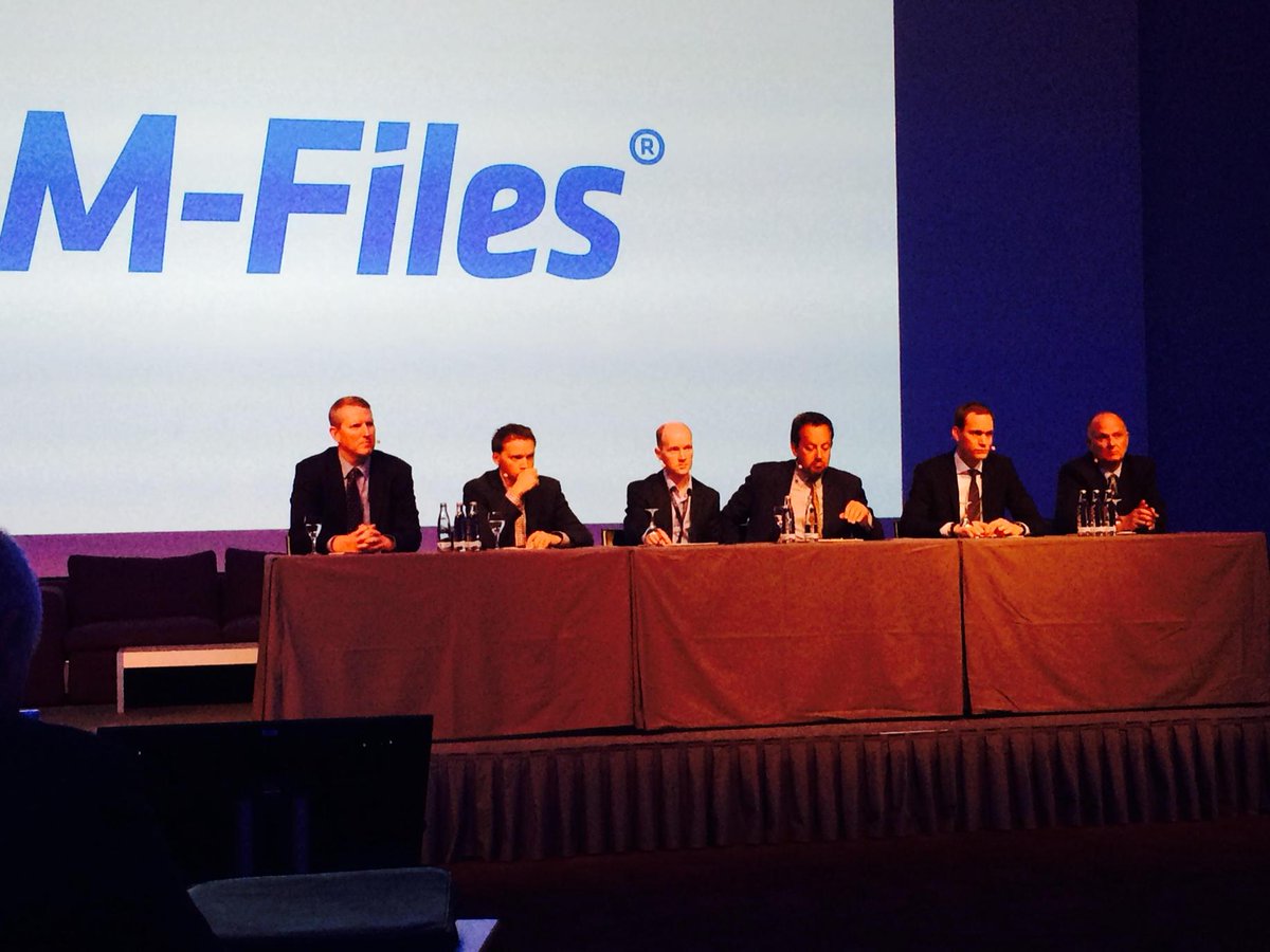 M_Files's tweet photo. @m_files executive team answers questions during a Q&A session @ 2015 Partner Meeting #mfilespartnersmunich http://t.co/2ROwgaSdIz