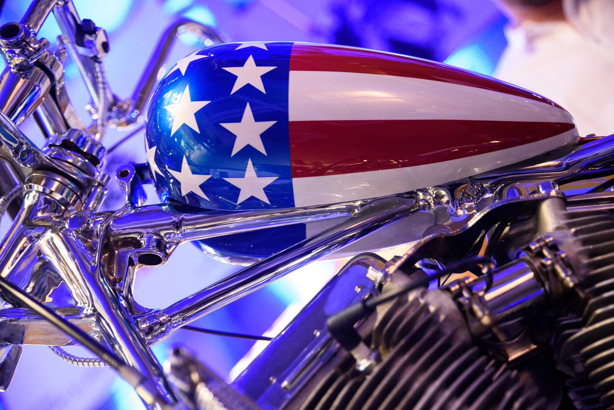IvanAvdeevP's tweet photo. New on view: the "Captain America" chopper from Easy Rider! Here's a peek at our installation process. #omgEMP http://t.co/CRhiry8uH9