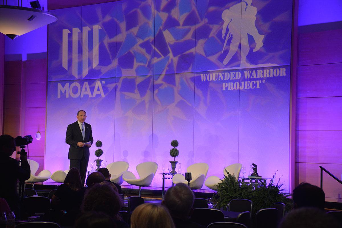 wwp's tweet photo. .@DeptVetAffairs Secretary McDonald at #WFS2015: The VA is focusing on #caregivers and families, they're heroes too. http://t.co/M6pWuMMffo