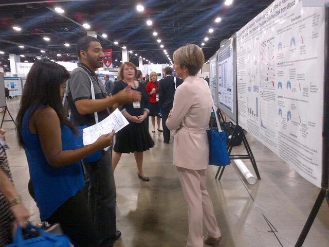 Melissa Johnson from @SarahCannonDocs with the biggest poster crowd at #WCLC2015