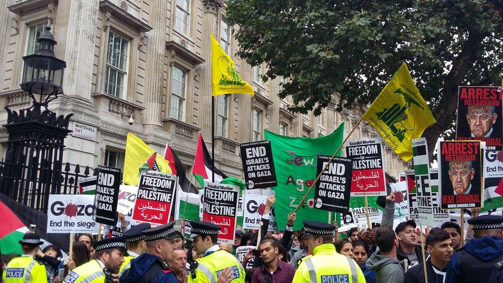 IdoDaniel's tweet image. #London, today, 10 Downing Street: #Hamas and #Hezbollah flags held by "peace activists" at "anti-Israel" demo