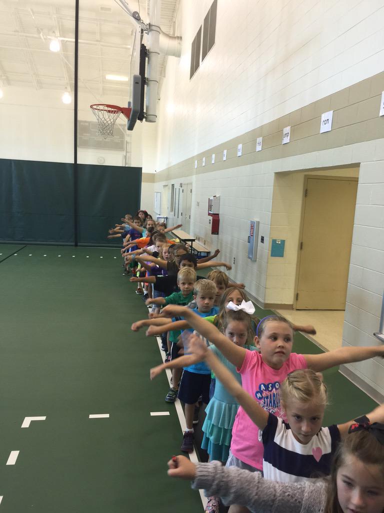 Stretching our muscles in gym!