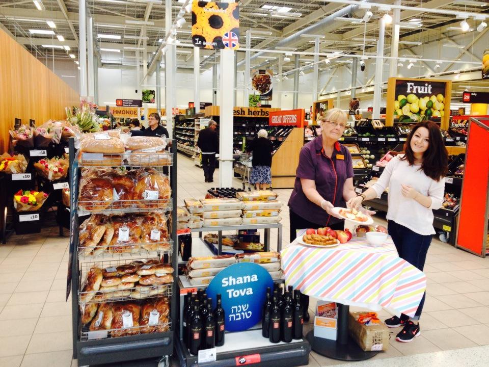 Viv celebrating at Sainsbury's Heatonpark  Jewish new year with customers sampling apple &amp; honey. #n07js@neilchason