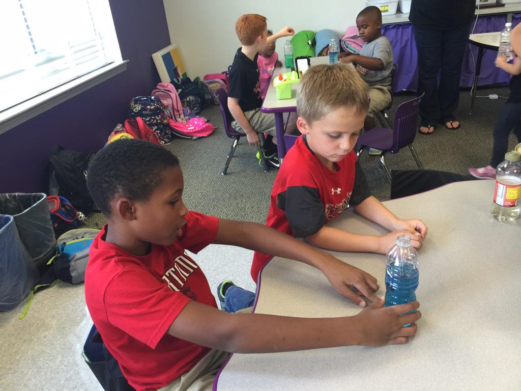 DrLABYRD's tweet photo. 5th graders helping their K5 buddies make sensory bottles.  #gacelem @GACKOsborne #labyrdgac http://t.co/JLRoenS8nP
