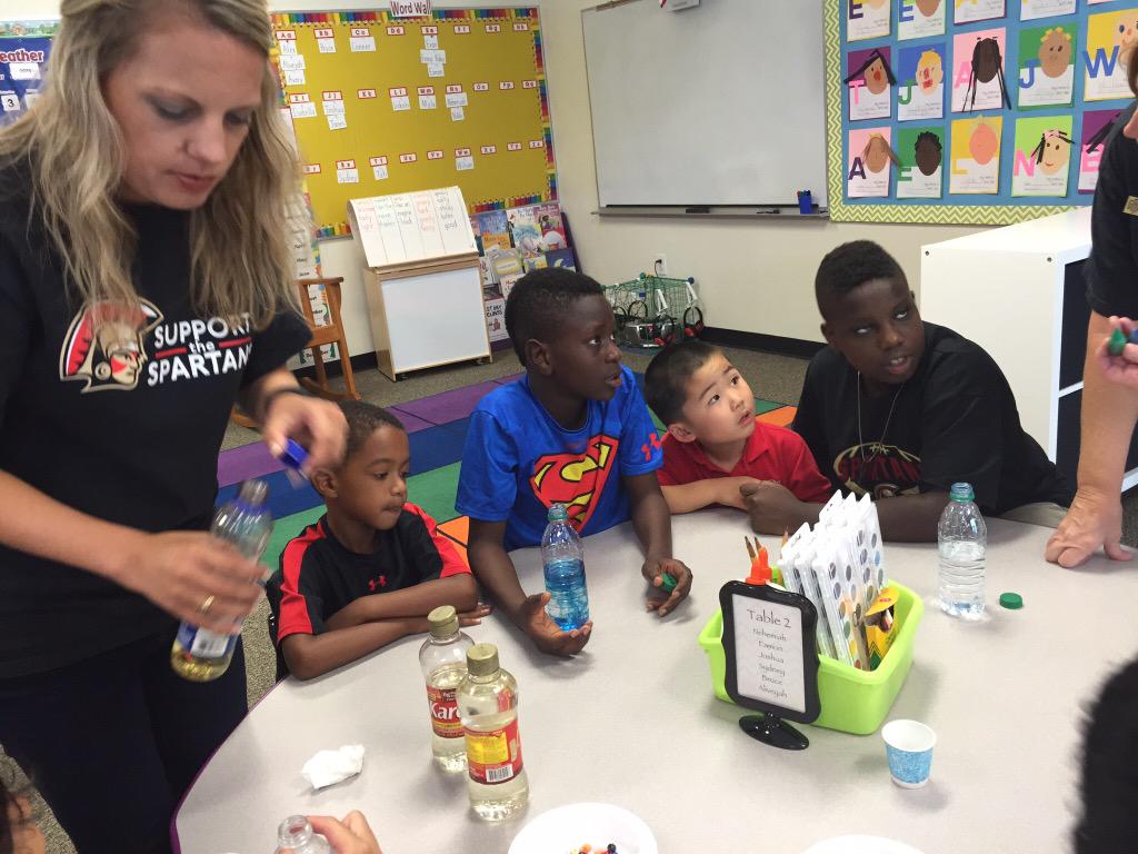 DrLABYRD's tweet photo. 5th graders helping their K5 buddies make sensory bottles.  #gacelem @GACKOsborne #labyrdgac http://t.co/JLRoenS8nP