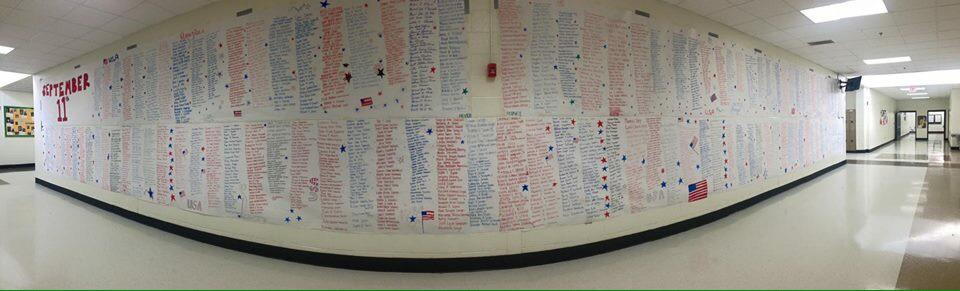 MrsFun4Life's tweet photo. @wsbtv Roswell HS moved their tribute inside due to weather. The name of every victim written by students #Project911 http://t.co/MOn5TZHfjU