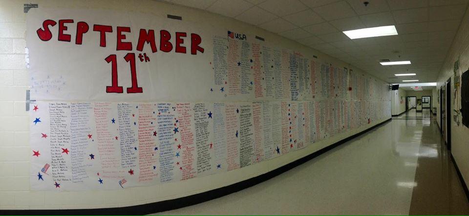 MrsFun4Life's tweet photo. @wsbtv Roswell HS moved their tribute inside due to weather. The name of every victim written by students #Project911 http://t.co/MOn5TZHfjU