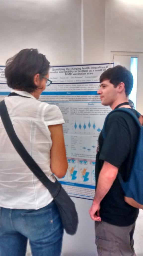 Gary Napier in a lively discussion about the space time pattern in measles susceptibility. #geomed2015