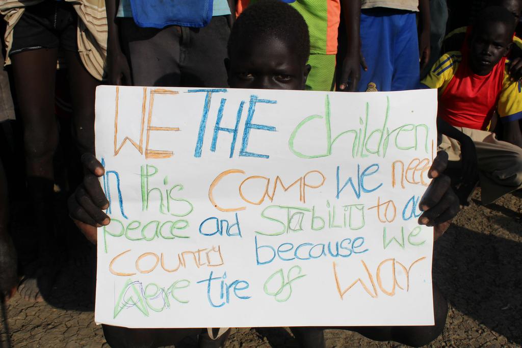 UNICEF's tweet photo. Peace. That’s what #SouthSudan children internally displaced by conflict are calling for. @unicefssudan http://t.co/a4Uohq14ie