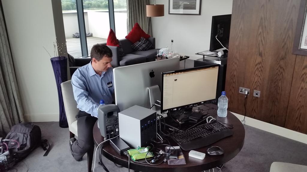 sousproductions's tweet image. @RobPorterFilms at snug #premierepro  setup in suite ready to help me on pretty heavy edit schedule at conference