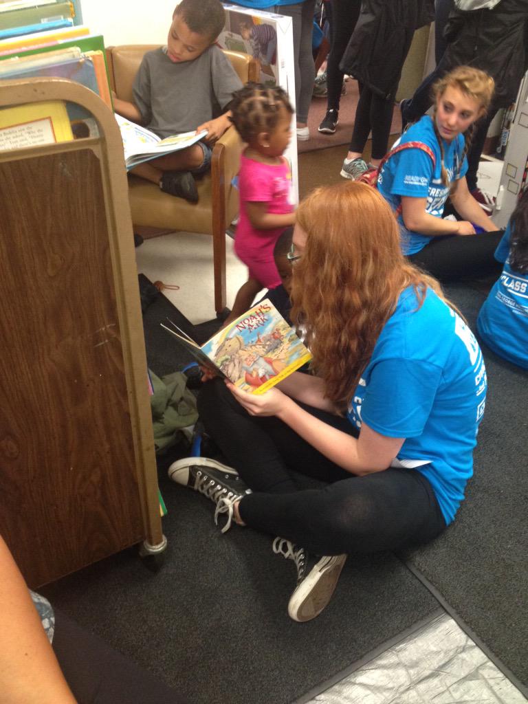 gelmanlibrary's tweet photo. #Classof2019 students reading with the kids at #GWFDoS2015. What a great way to serve on a rainy day! @GWService http://t.co/ycqZ67JaZ5