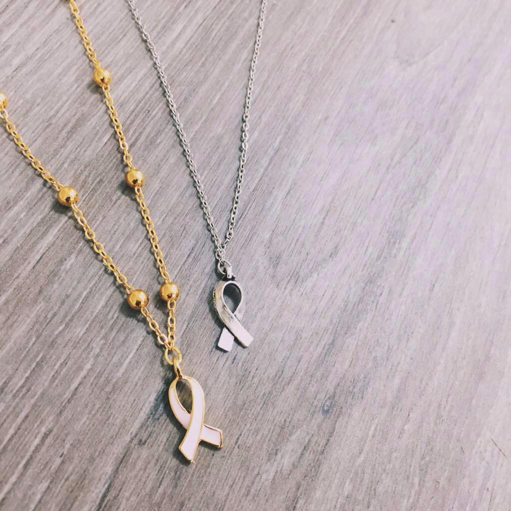 NotGirlyThingss's tweet image. Pink ribbon necklaces now available at stargazejewelry.com. Use promo code 'sns' for a discount on ur whole order😊