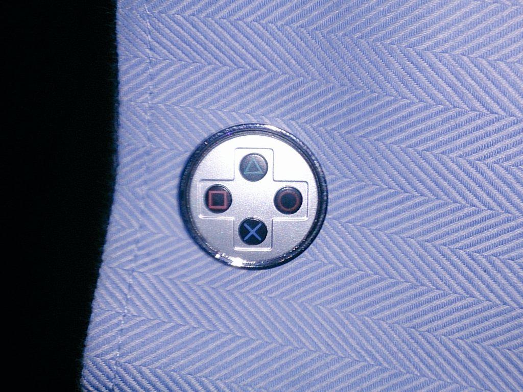 TheGodSupermint's tweet photo. Loving the new cufflinks at #egx #PlayStation  @mattyd128 @jerobolod @shinesevens @FF_Nash #pushsquare http://t.co/beRAMKOLo2