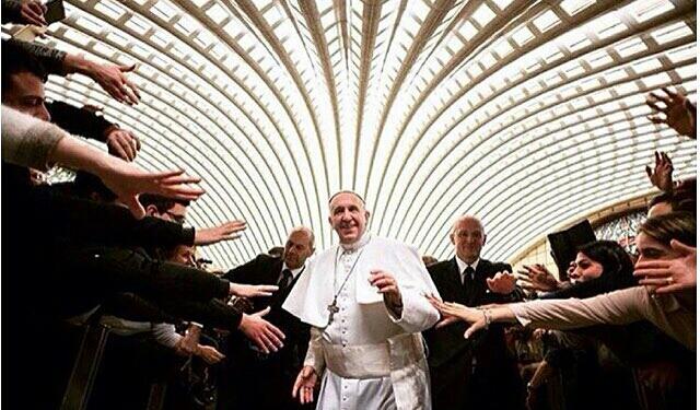 Pope Francis in Philadelphia looks like he in a Puff Daddy music video.