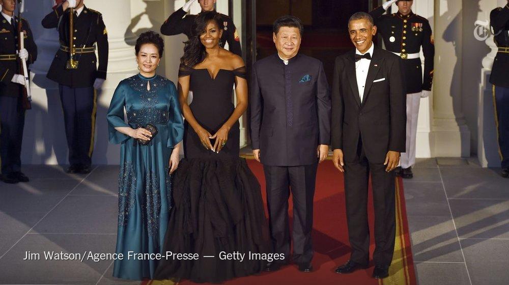 nytimes's tweet photo. Michelle Obama's State Dinner dress reflected her sartorial diplomacy http://t.co/A6OZx8mOFO http://t.co/Hb4PH6oiCv