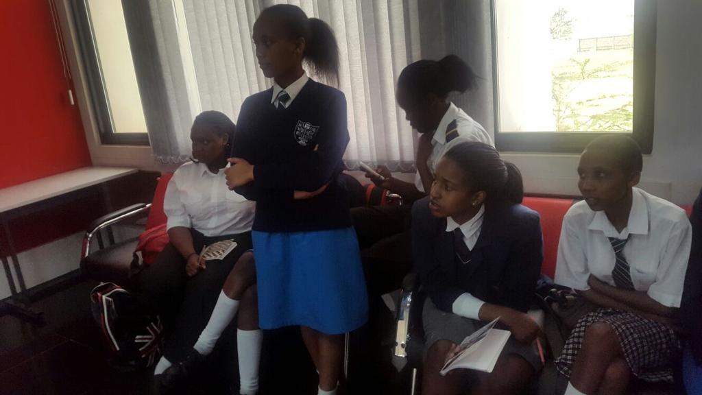 WAI_Kenya's tweet photo. Capt.Paul Njoroge of @KenyaAirways talking to the girls before their sim session during #GIAD15
#WAIKenyaChapter http://t.co/OwBlc2OmLo