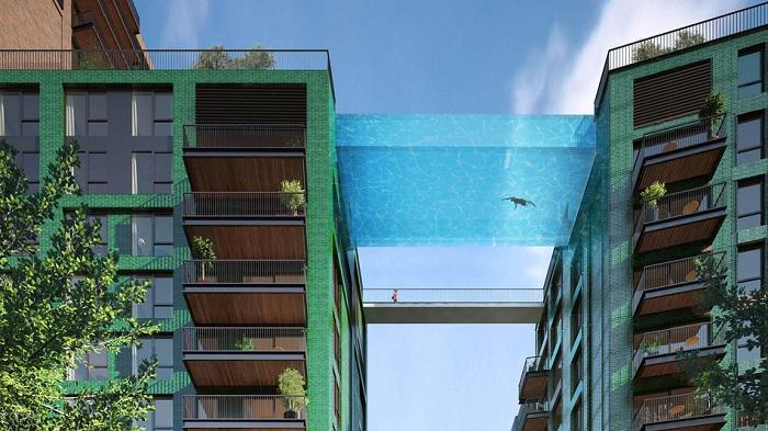 ScoopWhoop's tweet photo. You can literally #swim between buildings in these #SkyPools in #London: http://t.co/eYF235zRge http://t.co/1v2TrmbCZP