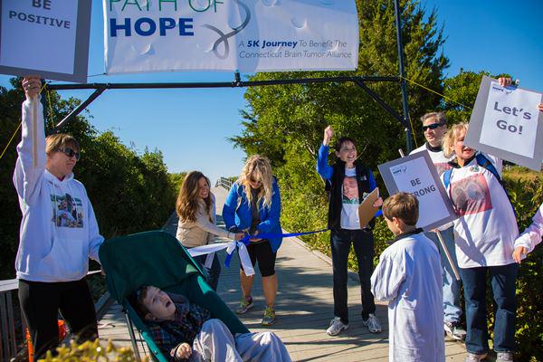 StephanieSimoni's tweet image. One week to sign up for the #PathofHope! Come say hi next Sunday! @ctbta Pic from 2014 getting cutting the ribbon.