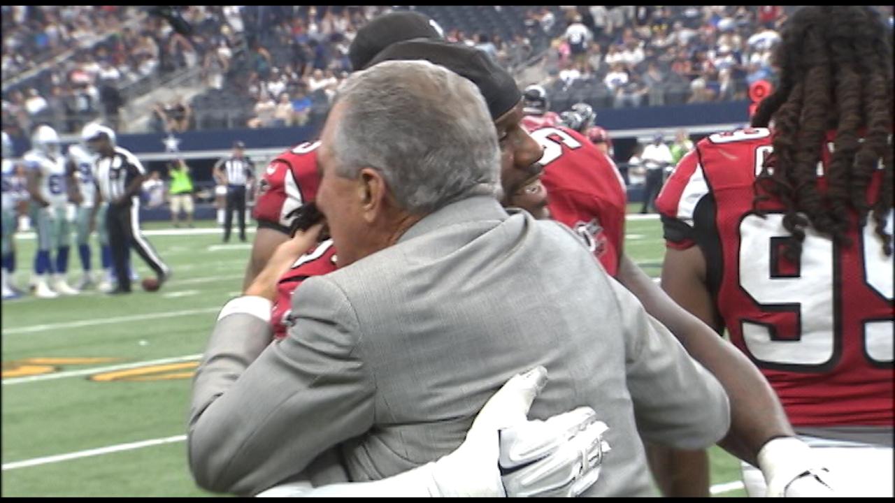 This is Jonathan Babineaux telling the boss man happy bday at end of the game. Arthur Blank turns 73 today. 