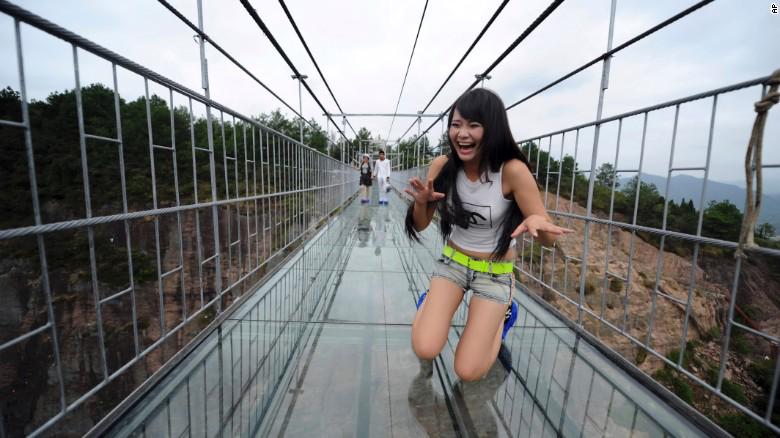 lonelyplanet's tweet photo. Scared of heights? MT @cnntravel: Terrifying glass-bottomed bridge opens China http://t.co/geKLblDYiH http://t.co/peg7XCMZ5L #lp #travel