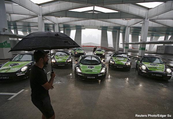 thejakartaglobe's tweet photo. .@GrabTaxiSG's fleet of luxury cars will be chauffeuring passengers for free during Singapore F1 Grand Prix season http://t.co/6loM6Ek4ID